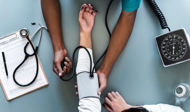 doctor examining patient