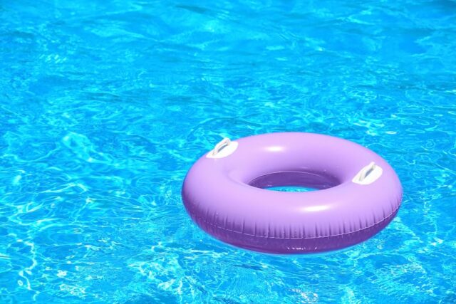 purple tube floating in pool