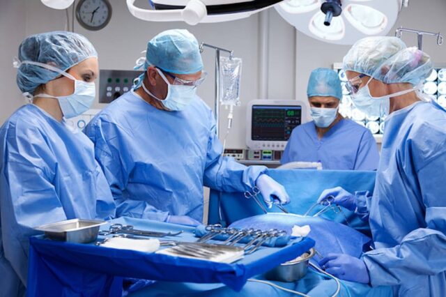 doctors preforming operation