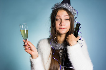 drunk girl holding champagne celebrating new year's